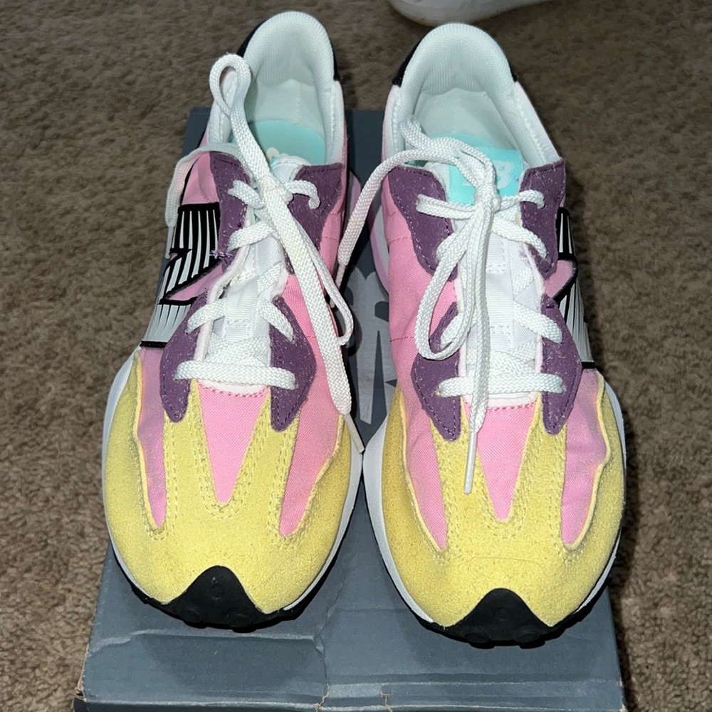 Kids pink and yellow new balance size 4.5